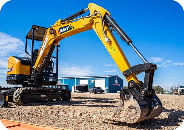 mini excavator parked in the parking lot