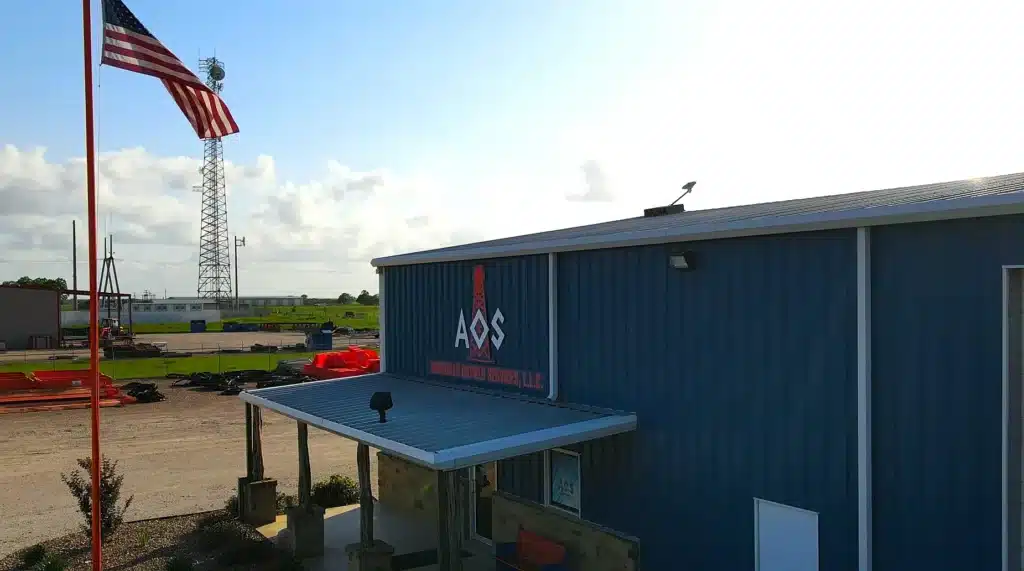 AOS building with the American flag