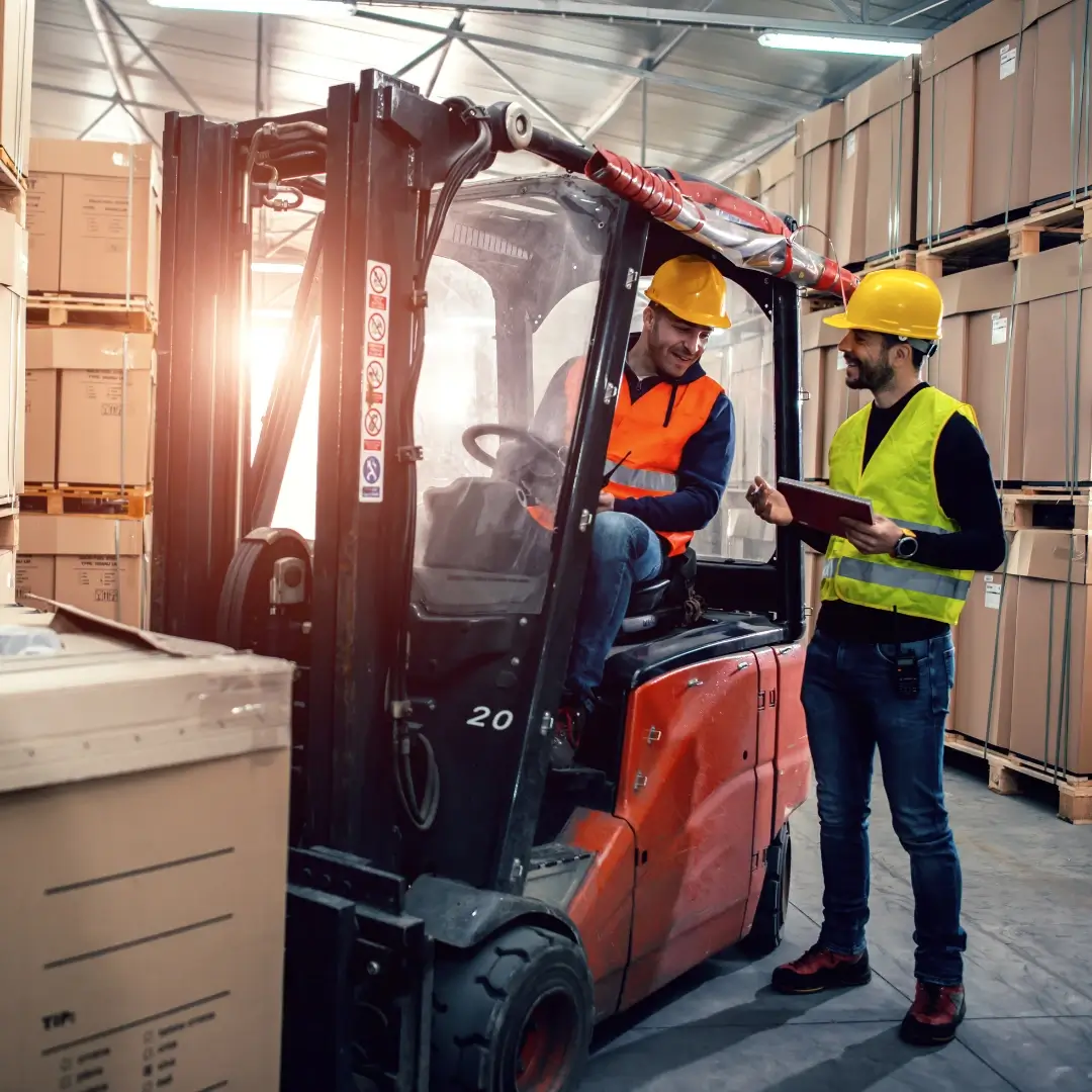 Forklift inspector with worker