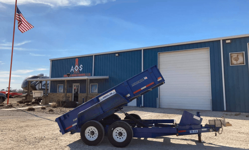 "Dump trailer with bed raised.