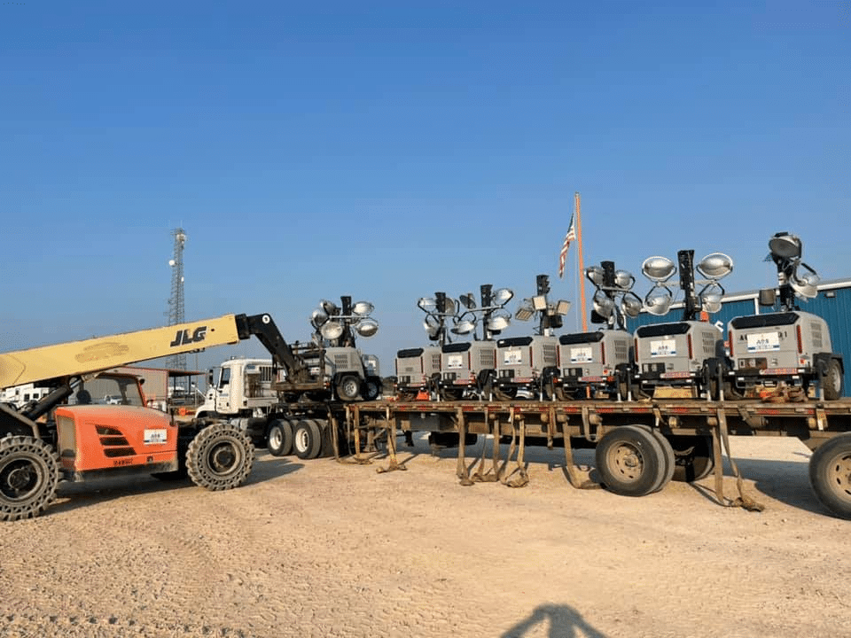 Multiple light towers loaded on trailer