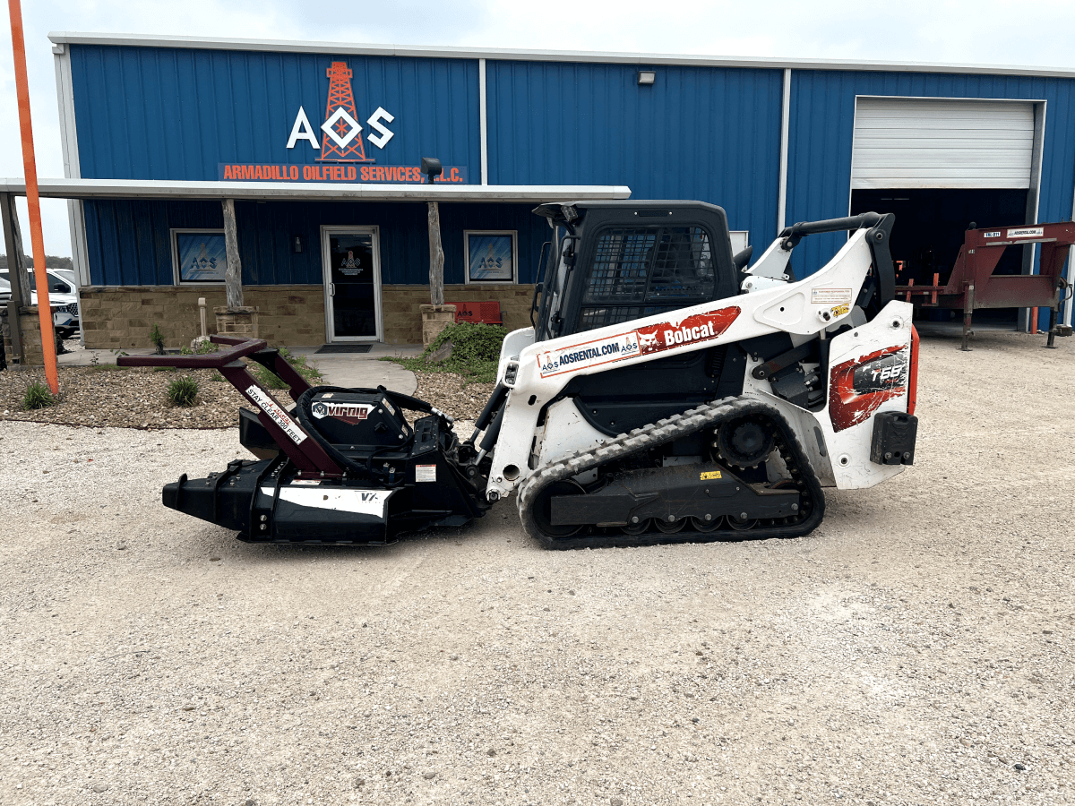 Bobcat T595 with tree mulcher attachment.