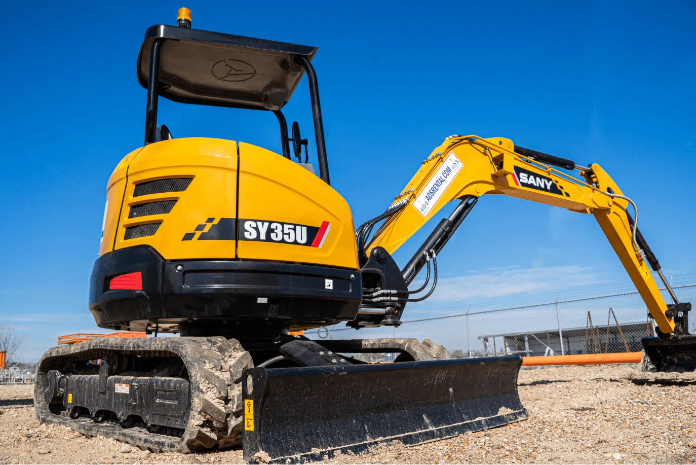 Yellow SANY SY35U mini excavator outdoors