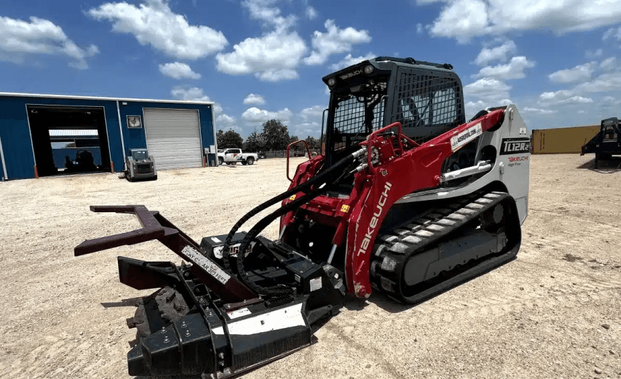 Takeuchi TL12R2 with tree mulcher attachment.